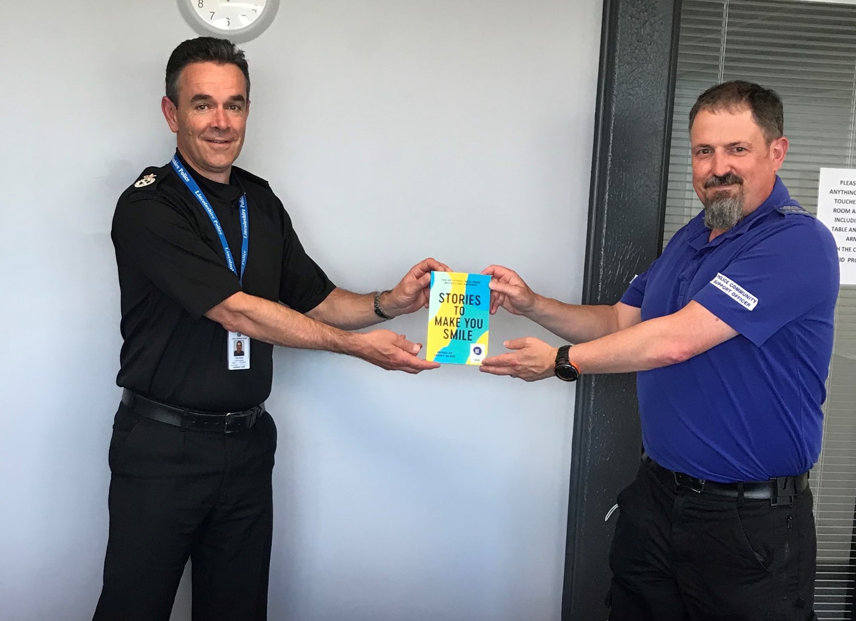 ULR Nigel Wass (Right) presenting the Chief with his copy